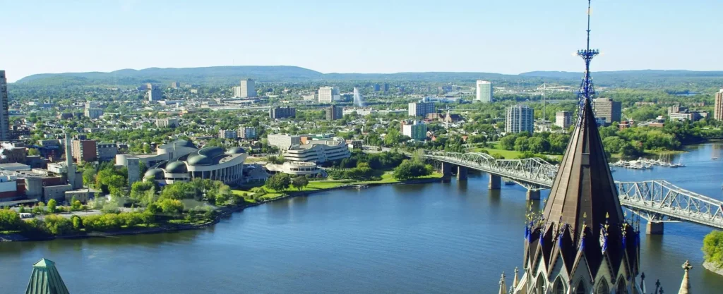 Aerial view of the Ottawa skyline featuring the Parliament buildings