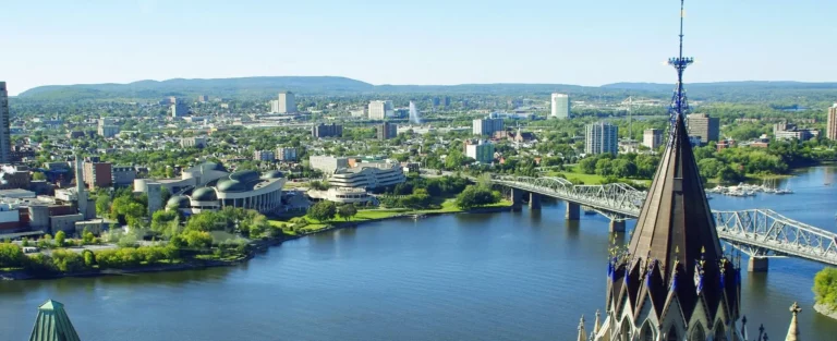 Aerial view of the Ottawa skyline featuring the Parliament buildings