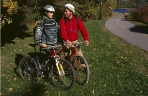 couple bicycling through park, Canada, ottawa